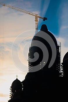 Silhouette of the construction site of Ã¢â¬ÅCatedrala Mantuirii NeamuluiÃ¢â¬Â People`s Salvation Cathedral at sunrise